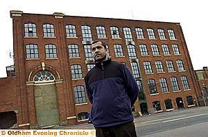 AWAITING APPROVAL . . . Ahmed Ali outside Oldham’s Anchor Mill 
