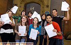 MAKING the grade . . . students from Oldham Sixth Form College celebrate their results. Back row, from left, Holly MacGregor, Rebecca Creamer, Lloyd Crowther, Natalie Bailey, Jonathan Hughes. Front row, from left, Emma Loker, Rebecca Massey, Mohammed Akhtar. Picture by ANTHONY MILLER 
