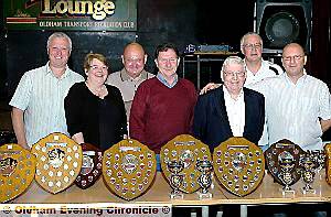 WINNERS in the Oldham Independent Log End League are pictured, left to right: Colin Howles (Black Diamond), Mary Bryson (Oldham Passenger Transport), Eric Albiston (Royal Oak), Alan Brown (Royal Oak), Peter Hunsley (chairman and secretary), Mick Royales (Druids Arms), Ray Wiseley (Royal Oak). 
Local sport 
