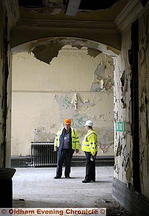 Council leader Howard Sykes, left and Steve Cooper, manager of the Corporate Property department, survey the decay. 
