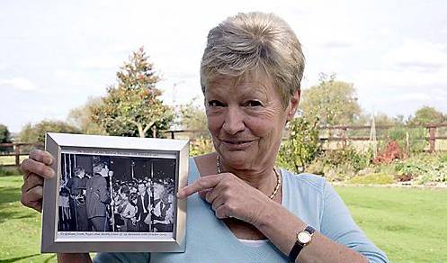 Gillian Gill with Beatles photo from 1963 Astoria gig.