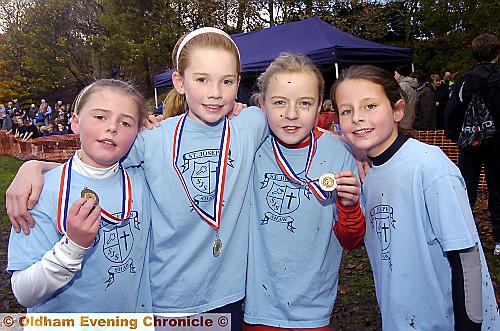 LET THE FOURTH BE WITH YOU: The St Joseph’s quartet who filled the first four places in the Year Five/Six race for girls. Pictured are Ella Rigby (left, third), Leah McDonald (first), Sophia Norbury (second), Ellie Morrison (fourth). 