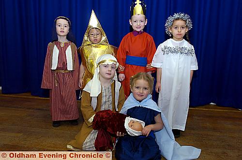 Brodie Bennett and Caitlyn Wright (front) took the lead roles of Joseph and Mary at Holy Rosary School, Fitton Hill. But all the children taking part proved little stars, including (back, from the left) Kayden Hidderley, Aimee Tang, Harry Marley and Cerise Roye