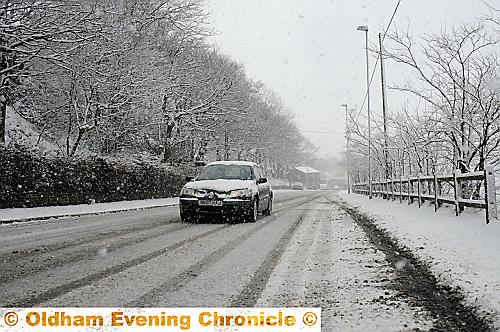 Snow turns Huddersfield Road at the Mumps into a white out