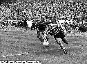 ALAN Davies, pictured scoring for Oldham in a 14-6 win over Wigan in March, 1957. 