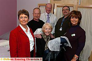 PATIENT Anne Kilgarriff (centre), from Chadderton, is pictured with (from left): Joanne Barber, senior complementary therapist at the Christie; Peter Hibbert, complementary therapist at Oldham Cancer Support Centre; Chris Hoyle; Dr Peter MacKereth, clinical lead for complementary therapy at the Christie; and Beverley Heap, complementary therapist at Oldham Cancer Support Centre. 
