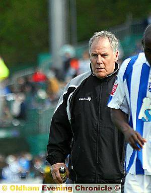 A FURIOUS Joe Royle heads to the dressing room after the half-time whistle at Brighton. 