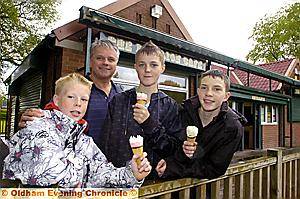 ICE CELEBRATIONS . . . Cafe owner Mike Cumiskey treated youngsters (from left) Sam Motley (10), Andrew Urmson (14) and Jack Motley (14).