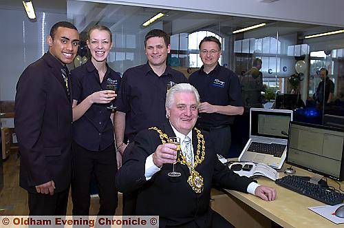 RAISING a toast . . . the Mayor, Councillor Jim McArdle, officially opens Web Applications with (back, from the left) Youth Mayor Mohammed Adil, office manager Vivienne Dean, chief executive Craig Dean and managing director systems division Andrew Stanley. 