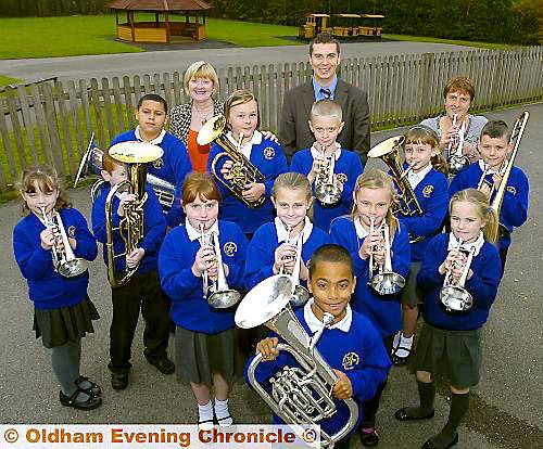 PUPIL Alexandre Pereira Do Amaral (front) with his musical classmates and (back, from the left) head teacher Lynne Burnley, brass teacher Andrew Wilson and parent-governor Tracey Hardman. 
