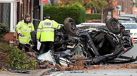THE aftermath of the crash in Middleton Road, Chadderton, in which three people were killed. PIC: courtesy Press Association 
