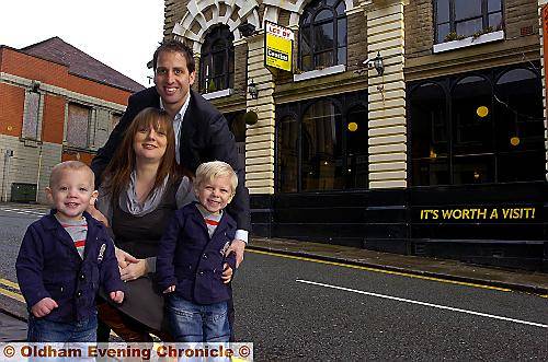 BIGGER and better . . . Paolo Bissolati, with partner Louise Crabtree and children Baden Bissolati (left) and Zachary Bissolati, outside the new home of the Old Bill restaurant in Greaves Street, Oldham 