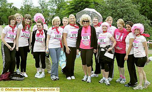 Jayne Clarke (race number 576), new principal at Oldham Sixth Form College, with competitors dressed as Olivia Newton John and the Pink Ladies from “Grease”, who have raised £1,506 so far 