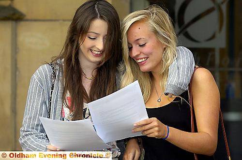 DELIGHTED Oldham Sixth-Form College students Erin McDaid (left) and Siobhan O’Donnell check their results 