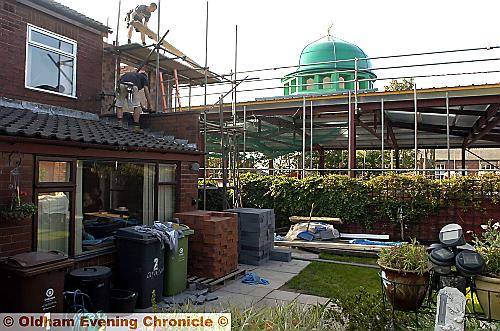 UNWELCOME view . . . the mosque is much higher than neighbouring residents expected 