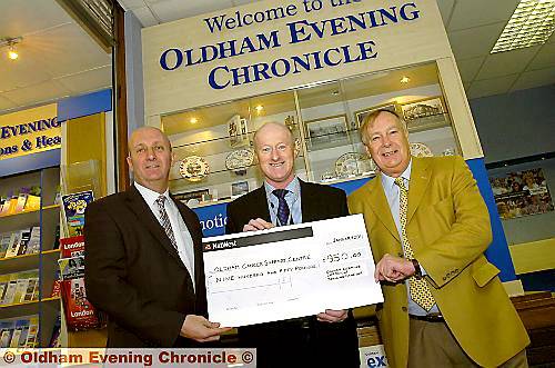 CHARITY bowled over: Chronicle Editor David Whaley (left) with Chris Hoyle and John Lord, the competition president. 
