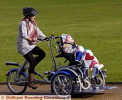 Fun for all . . . Chantel Slicker and Sophie Robinson on a specially-adapted bike 

