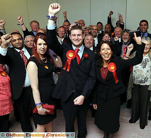 VICTORY! Jim McMahon celebrates with his partner Charlene Duerden, left, and Debbie Abrahams, MP for Oldham East and Saddleworth 
