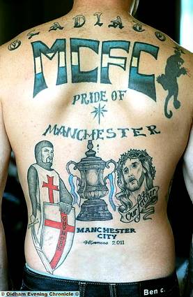 NEEDLE match . . . Craig Reed with his tattoo hailing City as FA Cup winners  

