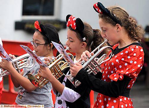 CUTE... Wardle High School in full Mini Mouse costumes as they delight the crowds.