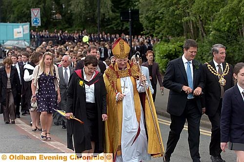 ON the march... the Blue Coat School Founder’s Day procession, led by Bishop of Middleton, the Right Rev Mark Davies.  

