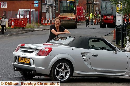 PROTEST... Jay brought roadworks to a halt after parking her car in the middle of the road 
