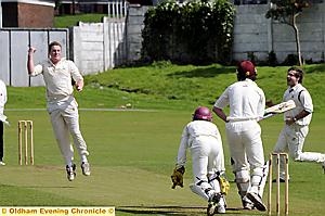 Royton batsman Ryan Carruthers is caught and bowled by Werneth's Matthew Taylor 
