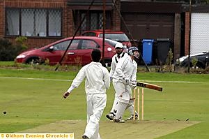 CRASH OF ASH: Ben Holt is bowled by Friarmere’s Abbass Ali in the first semi-final. 

