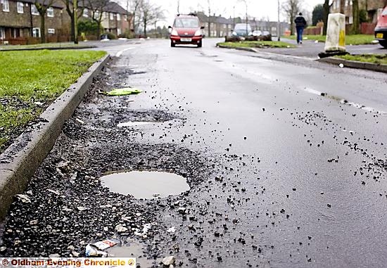 Potholes awaiting repair litter Oldham’s roads. 
