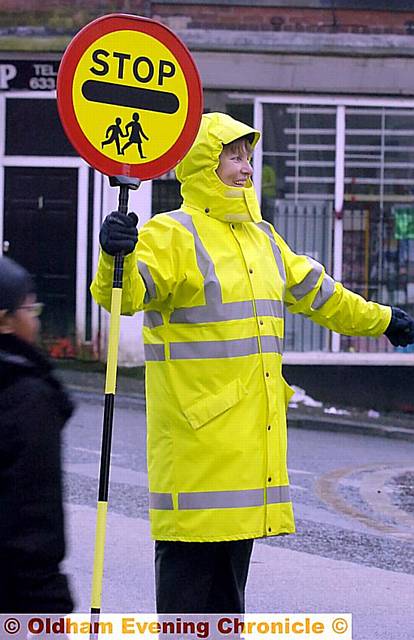 Irene Bennett, one of Oldham’s popular lollipop crossing patrols 
