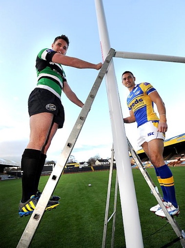 Kevin Sinfield (right) and Leeds Carnegie's Joe Ford with the new posts on the relaid Headingley pitch 