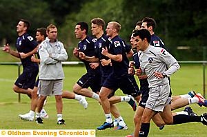 FIRST DAY BACK: Athletic’s players are put through their paces at training yesterday.  