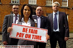 MP Debbie Abrahams challenges FTSE100 companies to sign the Prompt Payment Code. Pictured with her from, the left, are Philip King, Phil Thompson (Federation of Small Businesses and Phil McCabe (senior policy advisor with the Forum of Private Business)