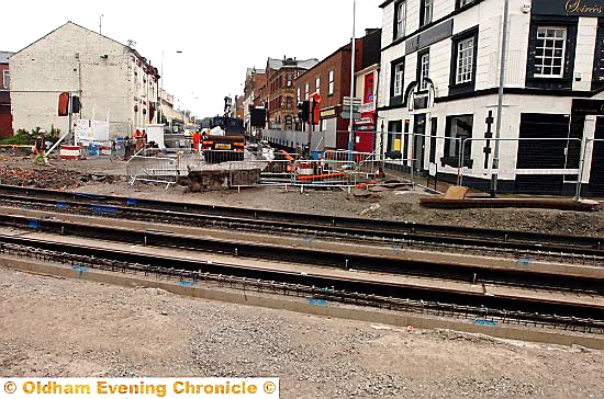 LAYING down the line: newly-laid tracks in front of the former Star Inn at the junction of King Street and Union Street mark the first appearance of tram lines for the town centre route. 
