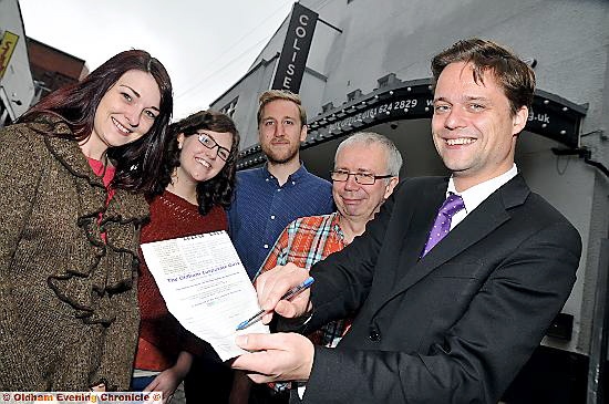 SIGN here . . . Lisa Pearson (left) from Dr Kershaw’s receives the first entry from the Coliseum team, from left, Suzy Kennedy, Ben Robinson, David Martin and John Edwards 
