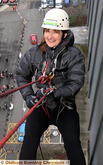 Council daredevil Carolyn Wilkins: the new chief executive of Oldham Council sets out on her abseil 

