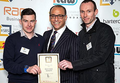 ENTREPRENEUR Theo Paphitis (centre) hands the Small Business Sunday award to Dean Kimpton (left) and Sam Green  