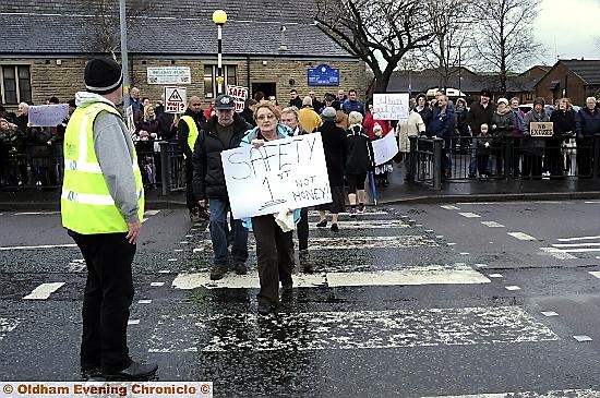 Protesters at the Milnrow Road crossing in Shaw 