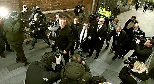 Coronation Street star Michael Le Vell was ushered through a throng of camerman and reporters as he arrived at court  

