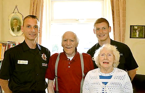 OUR HEROES: Joe and Florence with firefighters Graham Cooper and David Harrison, who spoted the leak 
