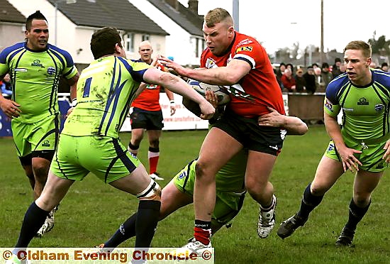 ON THE RUN: Oldham’s Danny Langtree takes up possession 