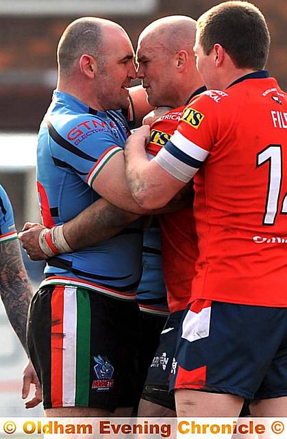 Rochdale’s Chris Hough and Mark Hobson (centre) have a disagreement. PICTURES: DARREN ROBINSON 