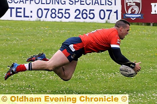 TRY: Steven Nield dives over for Oldham’s second. 
