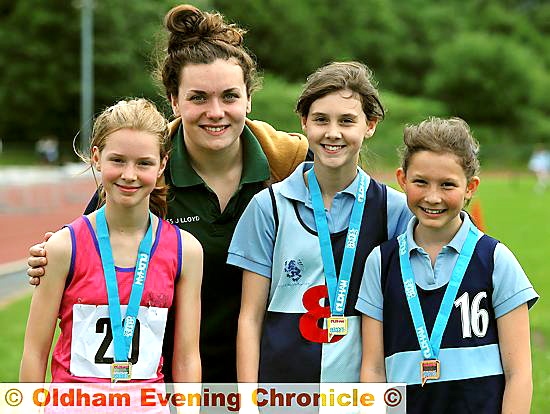 Pictured with guest Olympic swimmer Jessica Lloyd are the Year Seven girls’ 1500m medal winners. (l-r): Zara Hirst (silver), Sophie Hall (gold) and Daisy Shepherdson (bronze). 