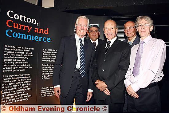 AT the book launch are (front, from left) Michael Meacher MP, author Ed Stacey, Roger Ivens, from the Oldham local studies and archive centre, (back, from left) Asian Business Association life president Tariq Amin and Steve Garland from the Heritage Lottery Fund 

