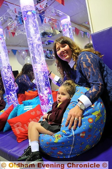 Ruby's sensory room at St Edward's school, with Ruby and her mum Natalie,