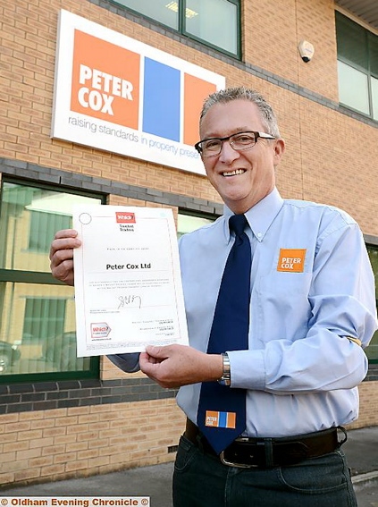 PROUD: managing director Keith Gilby with the Trusted Trader certificate