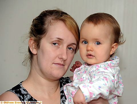 ON the road to recovery: mum Kim Harness with one-year-old Daiseigh who is now recovering after her ordeal