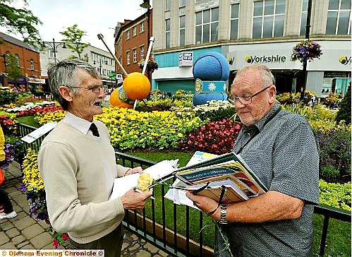 THE centre piece in Oldham town centre proved a winner with North-West in Bloom judges John Shepley (left) and Trevor Lees