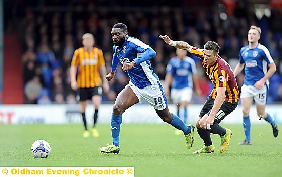 ON THE CHARGE . . .Jabo Ibehre sets off on a run afer evading his Bradford City marker. PICTURE by ALAN HOWARTH.